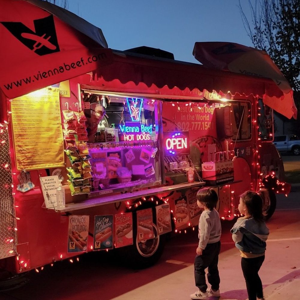 TJ's Dawg House - two children standing in front of a food truck - Hot Dogs Near Me - Richardson, Texas
