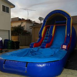 14ft tall, 9ft wide and 22ft long water slide.