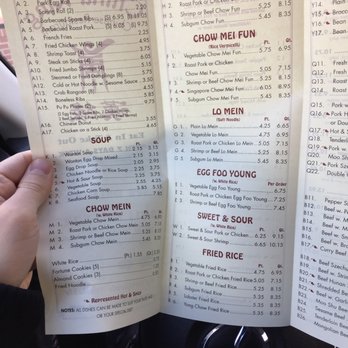 China King - a person holding a menu in their hand - Chinese Near Me - Hagerstown, Maryland