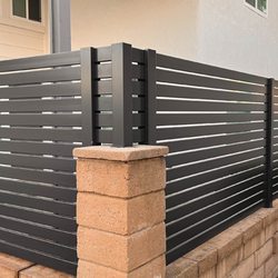 A G Vinyl Fencing - black luaminum wall topper fence
