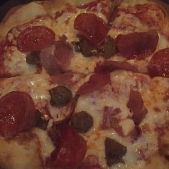 Thirsty Lion - Sausage pepperoni ham pizza - American Near Me - Denver, Colorado Thirsty Lion - Sausage pepperoni ham pizza - American Near Me - Denver, Colorado