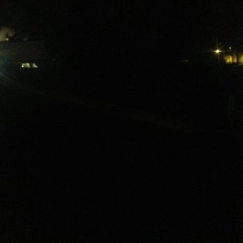 Margarita Summit Apartments - The well lit area where the tree has lifted the asphalt in the path of where one would park their car to the apartments - Apartments Near Me - Temecula, California
