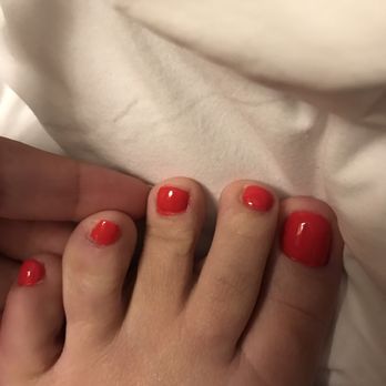 Rose's Nails - Poor paint job. Notice paint extends on to skin and some toenails are not fully painted. - Nail Salons Near Me - Hallandale Beach, Florida
