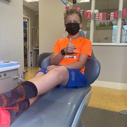 Sitting in dental chair Sitting in dental chair