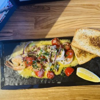 Cavo Bar and Kitchen - a plate of food - Bars Near Me - Vancouver, British Columbia Cavo Bar and Kitchen - a plate of food - Bars Near Me - Vancouver, British Columbia