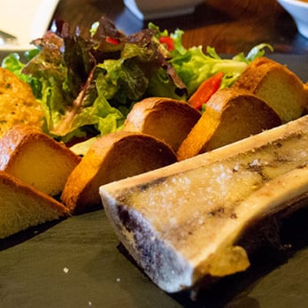 Trokay - bone marrow, with brioche toast, salad, and a pine nut tuile cookie. - New American Near Me - Truckee, California Trokay - bone marrow, with brioche toast, salad, and a pine nut tuile cookie. - New American Near Me - Truckee, California