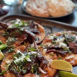 Loco Chon Bar & Grill Mexican Restaurant - Tacos asada with refried beans and rice
