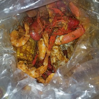 Shell Shock Seafood House - Crab boil - Snow crab legs, fresh crawfish, shrimp (head off) hot links, corn on the cobb, and potatoes. House sauce with medium spice. - Seafood Near Me - Hayward, California Shell Shock Seafood House - Crab boil - Snow crab legs, fresh crawfish, shrimp (head off) hot links, corn on the cobb, and potatoes. House sauce with medium spice. - Seafood Near Me - Hayward, California