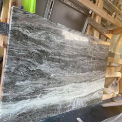 Credit River Granite Company - This is the darker one they want to use replace the lighter one. Would not match at all with the other counters that are installed.