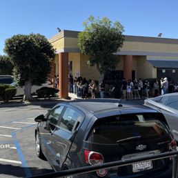 The line is wrapped around the entire building! Wrong day to get a drink here. They're giving away a special BTS collectible The line is wrapped around the entire building! Wrong day to get a drink here. They're giving away a special BTS collectible