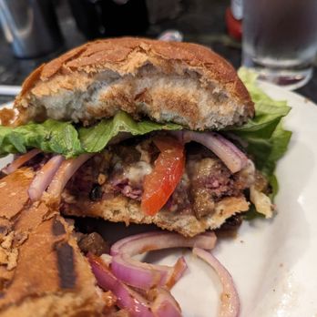 Mo's Grill - Alpine burger, medium rare after cutting in half - Burgers Near Me - San Francisco, California Mo's Grill - Alpine burger, medium rare after cutting in half - Burgers Near Me - San Francisco, California