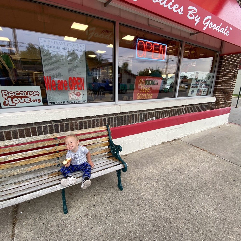 a child sitting on a bench a child sitting on a bench