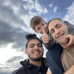 Tommy's Express® Car Wash - Awesome staff member from Tommy's, Sebastian with my family after a wash