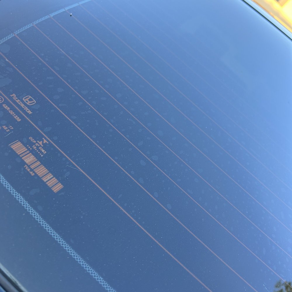 The Windows Tinting - Back window covered in bubbles - Car Window Tinting Near Me - San Fernando, California The Windows Tinting - Back window covered in bubbles - Car Window Tinting Near Me - San Fernando, California