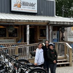 Munising E-bike Rentals - Young family trying out potential bike routes to Miners Castle and Pictured Rocks