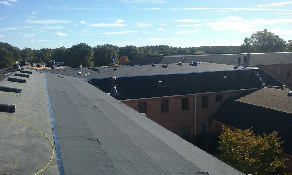 Slide of Tim's Roofing