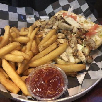 Wagon Wheel American Grill - Grilled chicken grinder with fries - American Near Me - Portland, Michigan Wagon Wheel American Grill - Grilled chicken grinder with fries - American Near Me - Portland, Michigan