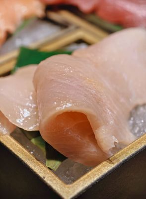 Kura Revolving Sushi Bar by null