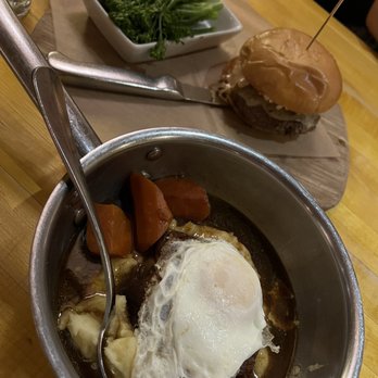 Salty Sow - Beef Shoulder with Yukon Gold Mashed Potatoes, Carrots, and topped with a fried egg. (Bottom) Ranger Cattle Wagyu Cheeseburger (Top) - American Near Me - Austin, Texas Salty Sow - Beef Shoulder with Yukon Gold Mashed Potatoes, Carrots, and topped with a fried egg. (Bottom) Ranger Cattle Wagyu Cheeseburger (Top) - American Near Me - Austin, Texas