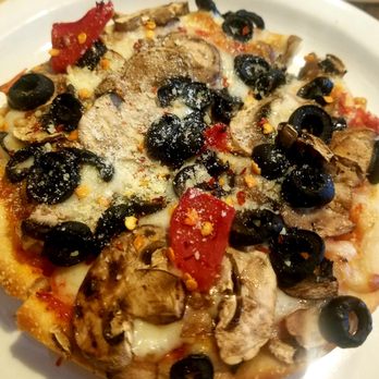 Pizz'A Chicago - After red chili flakes! - Pizza Near Me - Santa Clara, California Pizz'A Chicago - After red chili flakes! - Pizza Near Me - Santa Clara, California