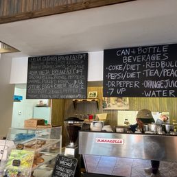 menus on the wall above the counter