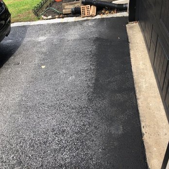 Sure Seal - Brand new driveway, and then their seal-coat washed away and stained most of the driveway. - Snow Removal Near Me