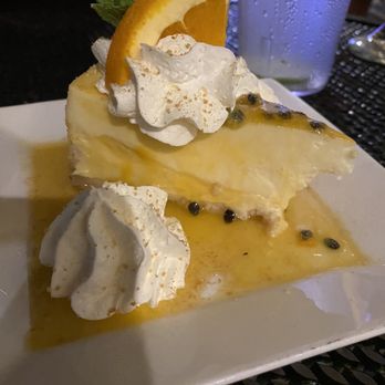 Gandules Grill - Mango passion fruit cheesecake - Puerto Rican Near Me - Lehigh Acres, Florida Gandules Grill - Mango passion fruit cheesecake - Puerto Rican Near Me - Lehigh Acres, Florida