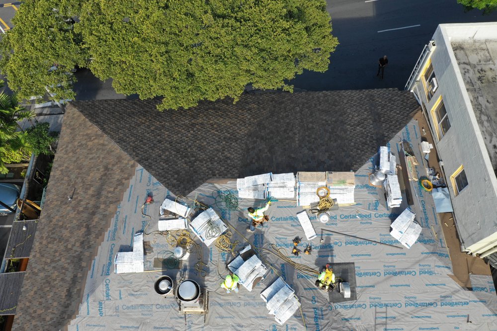 Slide of AL Roofing & RainGutters