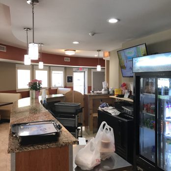 La Roca Restaurant - a view of the kitchen and dining area - Spanish Near Me - Providence, Rhode Island La Roca Restaurant - a view of the kitchen and dining area - Spanish Near Me - Providence, Rhode Island