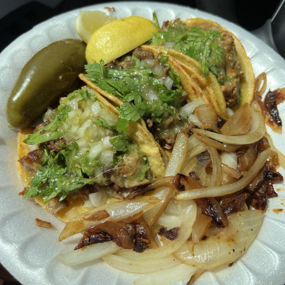 tacos with lemon, grilled onions and peppers