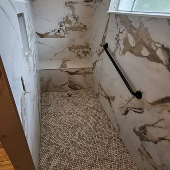 Affordable Shower - a view of a marbled bathroom - General Contractors Near Me Affordable Shower - a view of a marbled bathroom - General Contractors Near Me