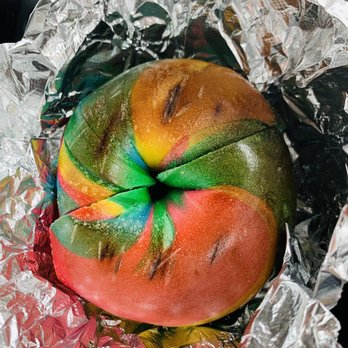 Long Island Bagel Cafe - Rainbow Bagel toasted with butter - Bagels Near Me - Mineola, New York Long Island Bagel Cafe - Rainbow Bagel toasted with butter - Bagels Near Me - Mineola, New York