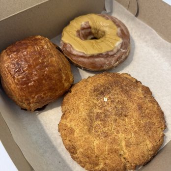 La Rue Doughnut - Pain Au Chocolat snickerdoodle cookie and Pistachio donut - Bakeries Near Me - Dallas, Texas La Rue Doughnut - Pain Au Chocolat snickerdoodle cookie and Pistachio donut - Bakeries Near Me - Dallas, Texas