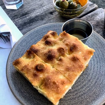 Mezzanotte - Focaccia & olives - Italian Near Me - Seattle, Washington Mezzanotte - Focaccia & olives - Italian Near Me - Seattle, Washington