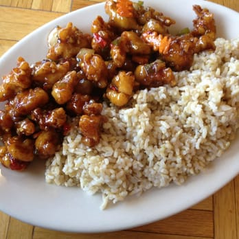 Rice Time - Genera Tso's Chicken with Brown Rice. - Asian Fusion Near Me - Wilsonville, Oregon Rice Time - Genera Tso's Chicken with Brown Rice. - Asian Fusion Near Me - Wilsonville, Oregon