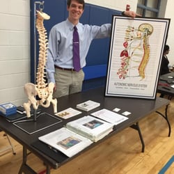McAuliffe Chiropractic Office - Dr. Terence at a health screening