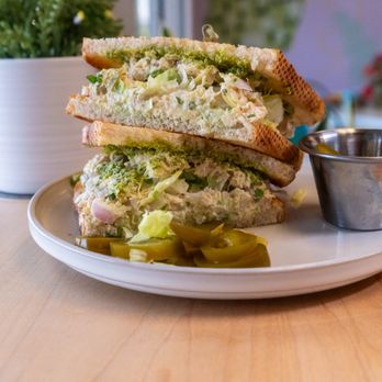 Bites & Bowls - a tuna salad sandwich with pickles - Breakfast & Brunch Near Me - Springdale, Arkansas