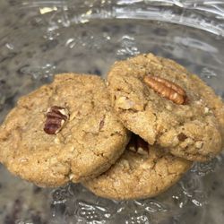 Transport yourself to butter pecan bliss with our incredible cookies! Each bite offers a chewy texture and that signature nutty, buttery swe