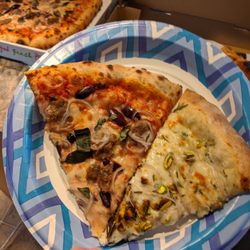 Mulberry Station Brewing Company - Slice of classic sausage on the left and "The Stache" on the right. Pistachios on pizza?? Who knew!?