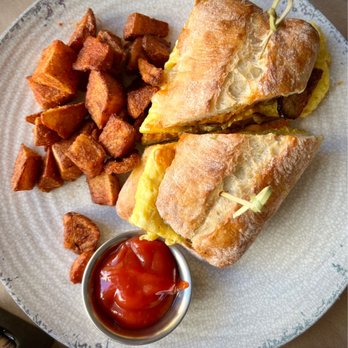 San Chez Bistro - Breakfast sammy with sausage! Now my daughter's fave. - Breakfast & Brunch Near Me - Grand Rapids, Michigan San Chez Bistro - Breakfast sammy with sausage! Now my daughter's fave. - Breakfast & Brunch Near Me - Grand Rapids, Michigan