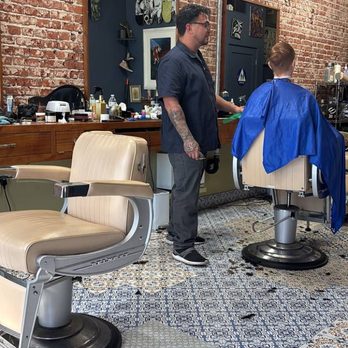 John Q Public Barbershop - Mike G cutting hair - Barbers Near Me - Oceanside, California John Q Public Barbershop - Mike G cutting hair - Barbers Near Me - Oceanside, California