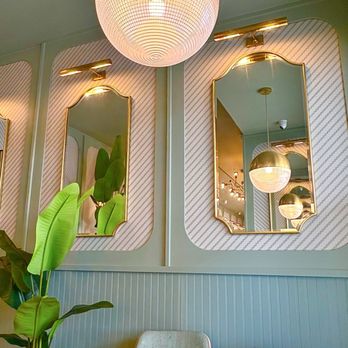 The Greenery Creamery - Seats like this in the back corner. Also tables and chairs in the front on the wall - Ice Cream & Frozen Yogurt Near Me - Orlando, Florida The Greenery Creamery - Seats like this in the back corner. Also tables and chairs in the front on the wall - Ice Cream & Frozen Yogurt Near Me - Orlando, Florida