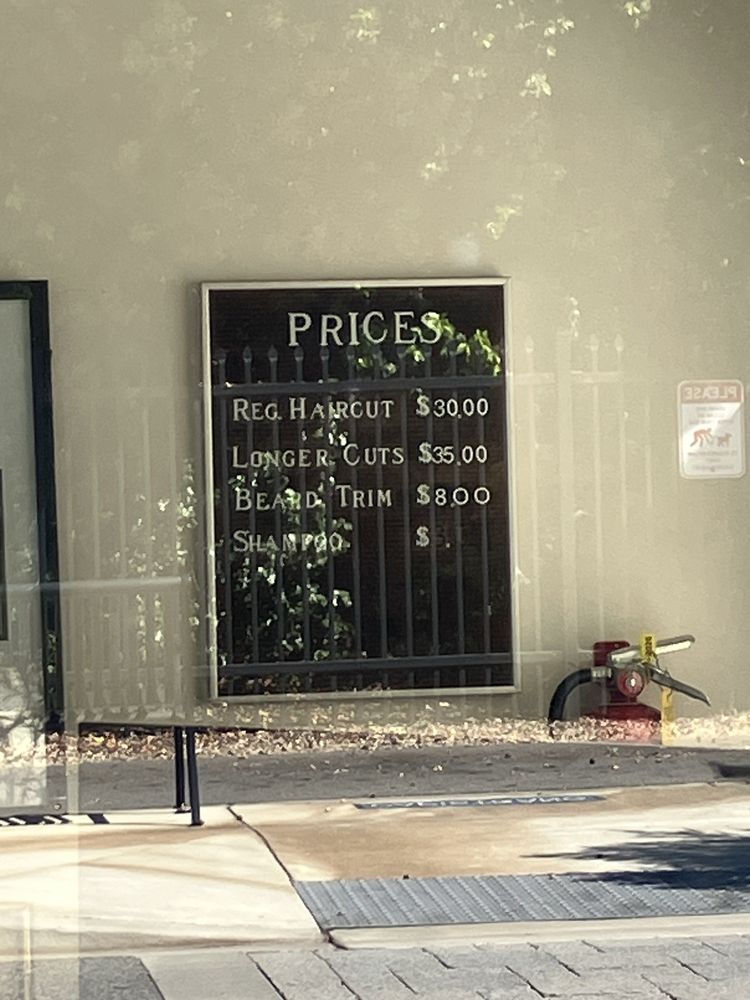 Willie Romero's Barber Shop Logo