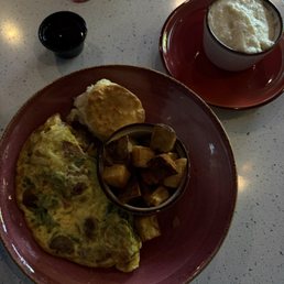 Meat Lovers Omelet, potatoes & a fluffy biscuit. A side of grits that you better try Meat Lovers Omelet, potatoes & a fluffy biscuit. A side of grits that you better try