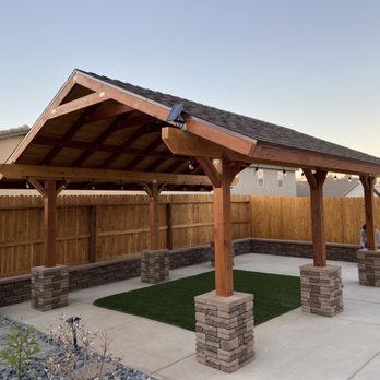 Garcias Concrete and Landscaping - Custom built redwood stained patio cover with tan block pilasters with complimenting retaining wall, artificial turf also installed. - Landscaping Near Me Garcias Concrete and Landscaping - Custom built redwood stained patio cover with tan block pilasters with complimenting retaining wall, artificial turf also installed. - Landscaping Near Me