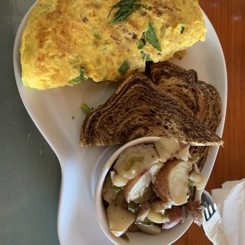 Two Chicks Cafe - Seafood omelette with potatoes and rye - Breakfast & Brunch Near Me - New Orleans, Louisiana Two Chicks Cafe - Seafood omelette with potatoes and rye - Breakfast & Brunch Near Me - New Orleans, Louisiana