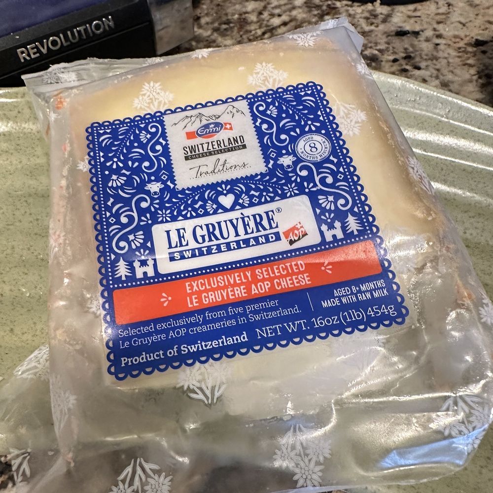 Emmi Roth - a package of cheese sitting on a counter - Cheese Shops Near Me - Fitchburg, Wisconsin Emmi Roth - a package of cheese sitting on a counter - Cheese Shops Near Me - Fitchburg, Wisconsin