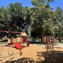 Eucalyptus Park - Good size playground with 4 baby swings and two older kid swings