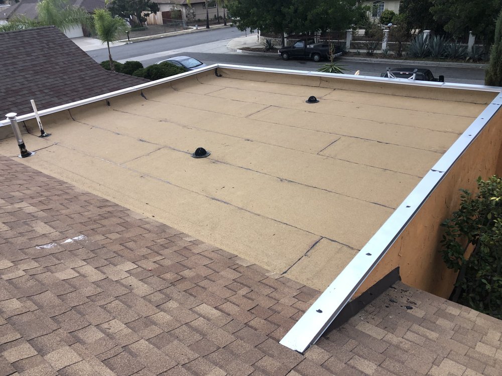 Slide of Escamilla’s Roofing and Rain Gutters