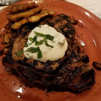 Meril - Pork Porterhouse - New American Near Me - New Orleans, Louisiana Meril - Pork Porterhouse - New American Near Me - New Orleans, Louisiana